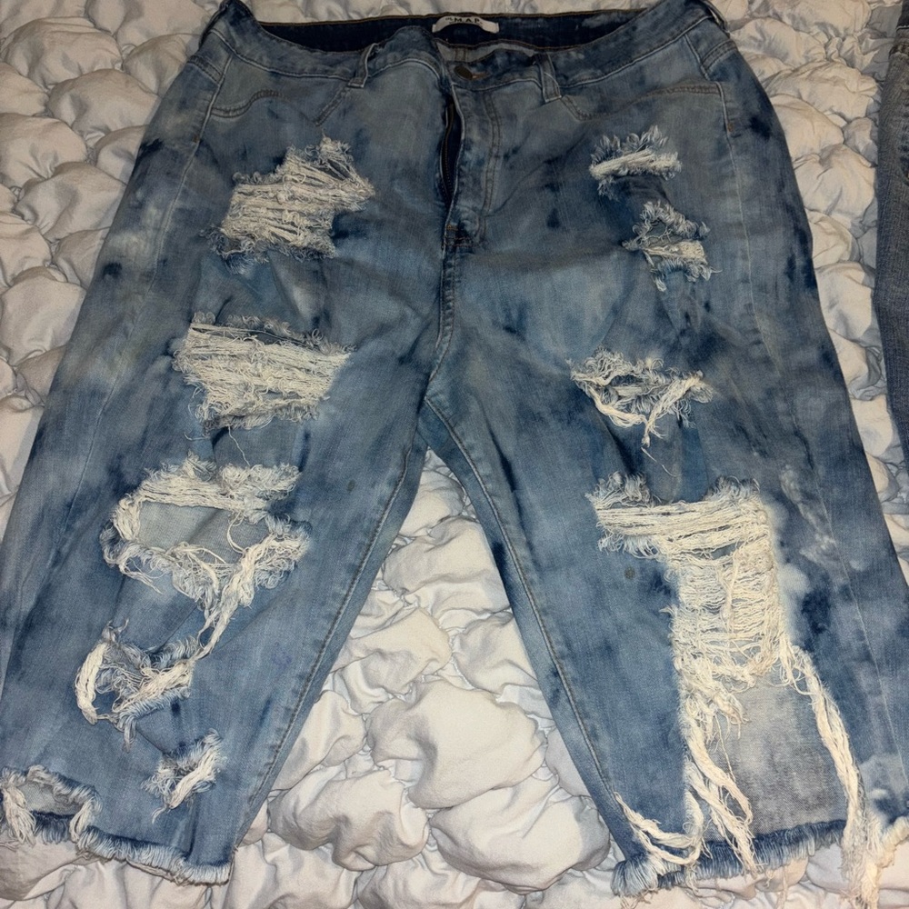 Distressed Light Blue Jeans